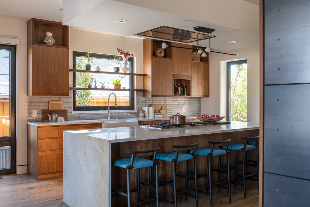 Kitchen in Bozeman House by Envi Interior Design