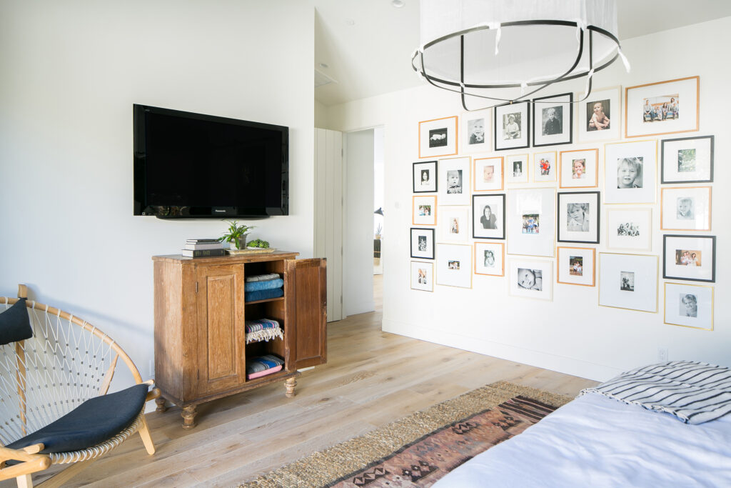 Large Gallery Wall Bedroom by Skout Interior Design