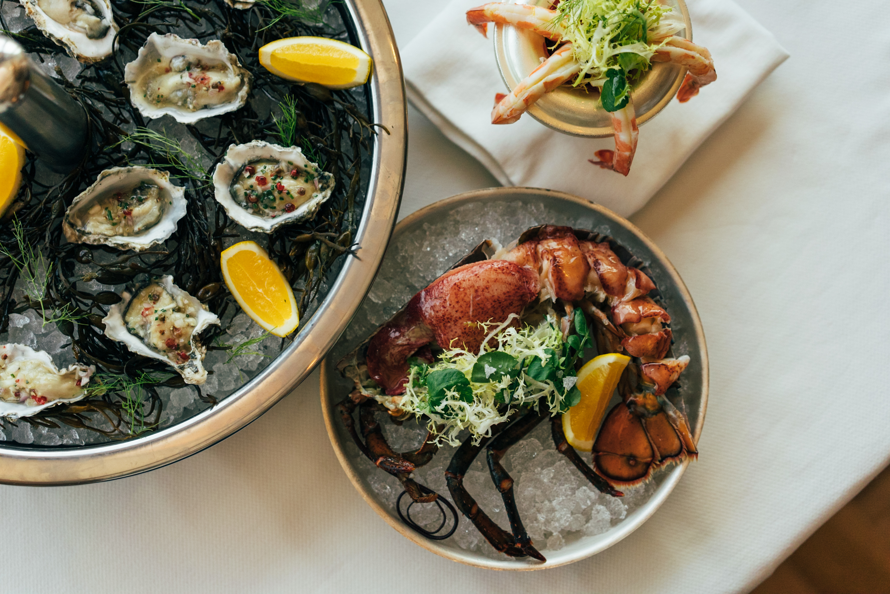 raw-bar-seafood-selection-the-oysters-are-kept-in-a-one-of-a-kind-in-house-estuary