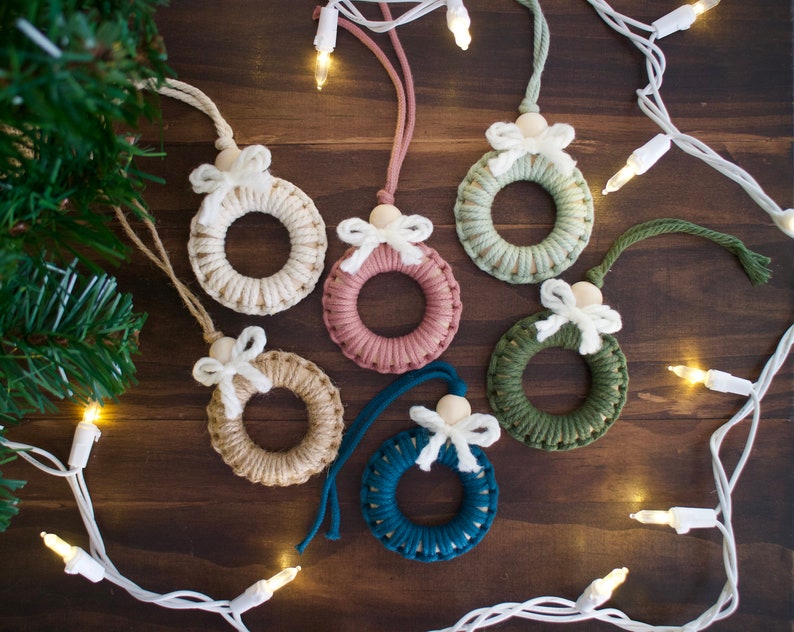 white pink teal green blue and tan macrame wreaths with bows