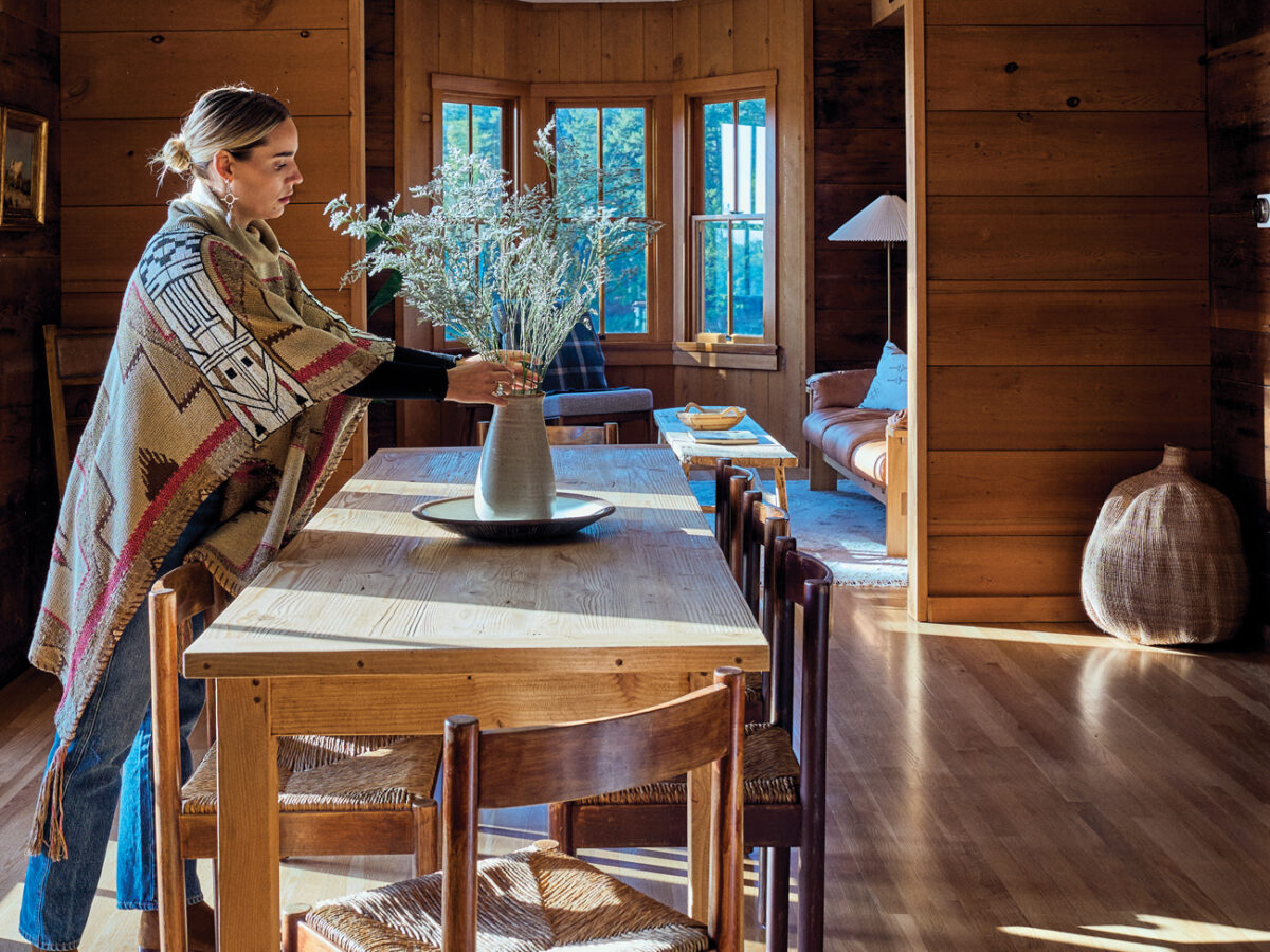 Eva Holbrook Arranging Flowers in the Dining Room
