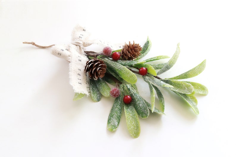 faux mistletoe sprig with worded ribben