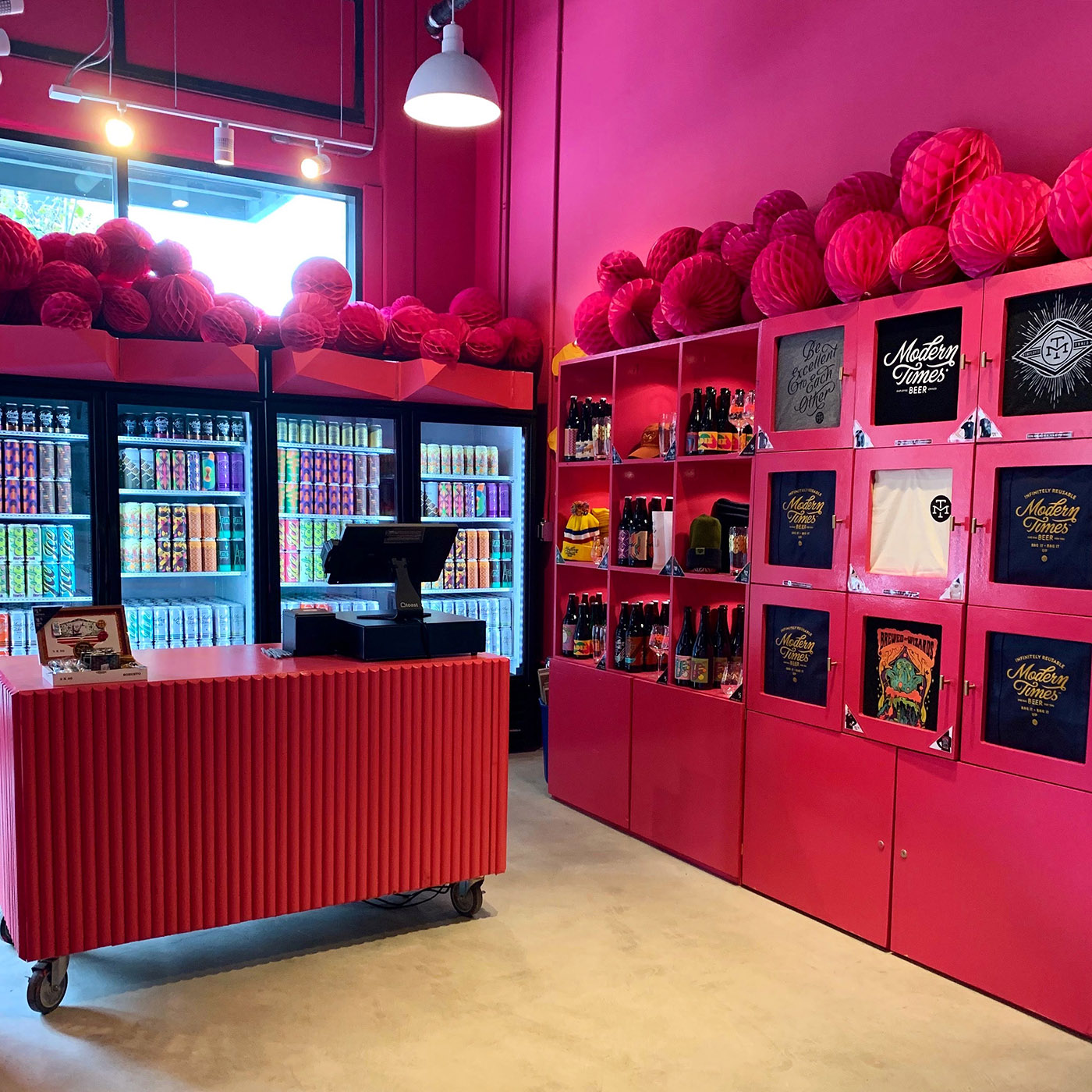 Beer and merchandise for sale at Modern Times' Oakland taproom