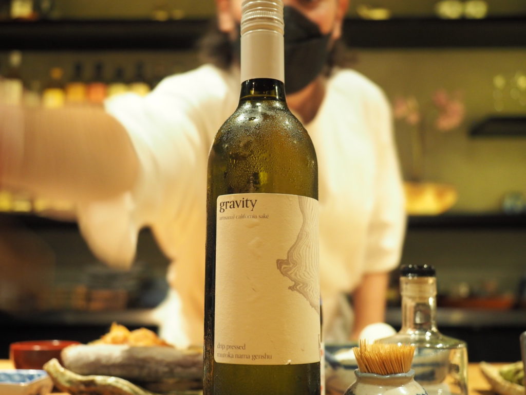 Nova Brewing's Gravity bottle shown at restaurant.