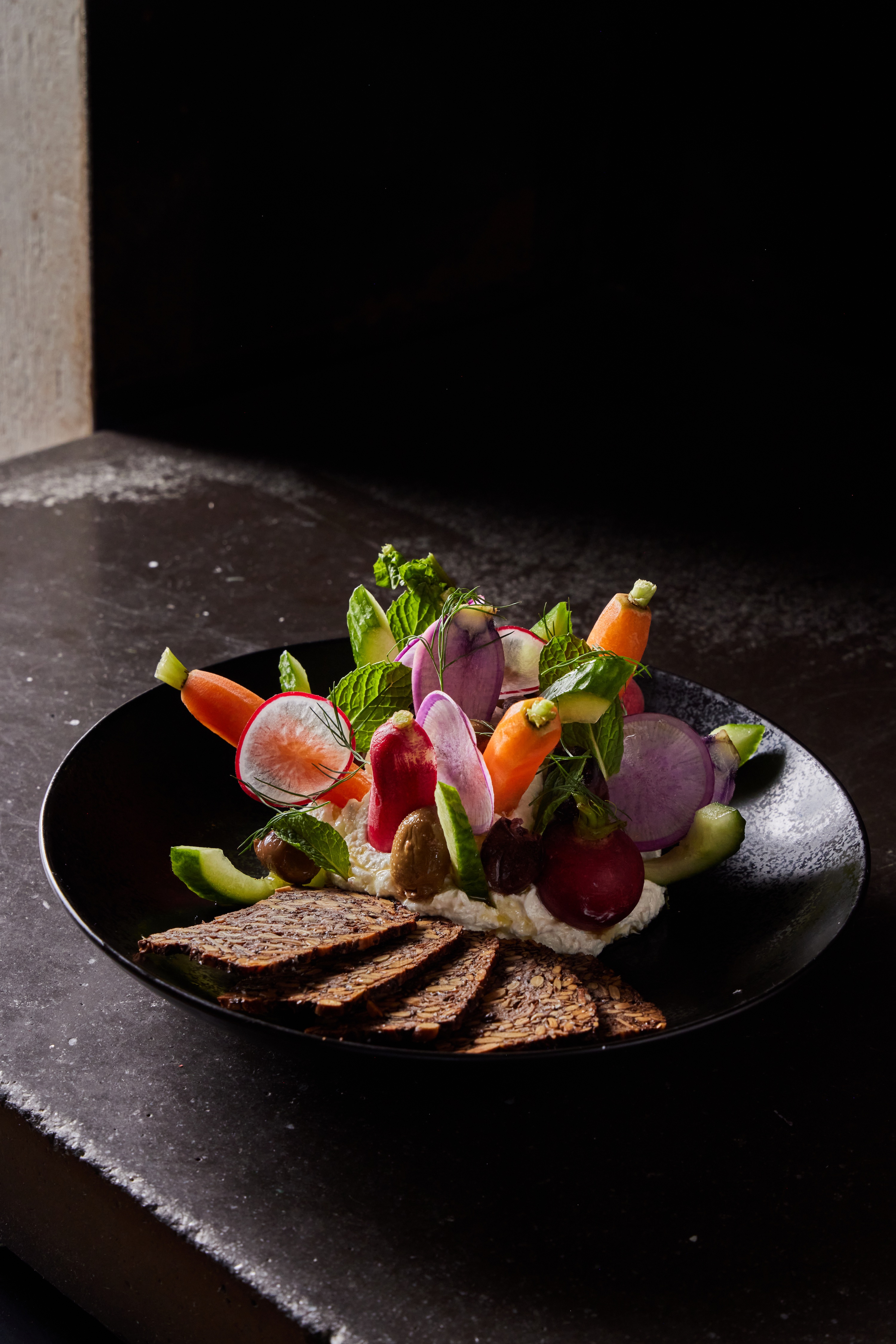 whipped-feta-garlic-dip-mint-cucumber-olives-radish-seeded-crackers