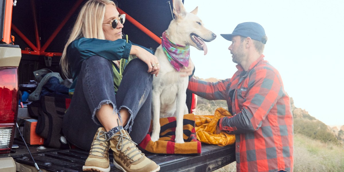 Kate and Matt and Woody in the Truck