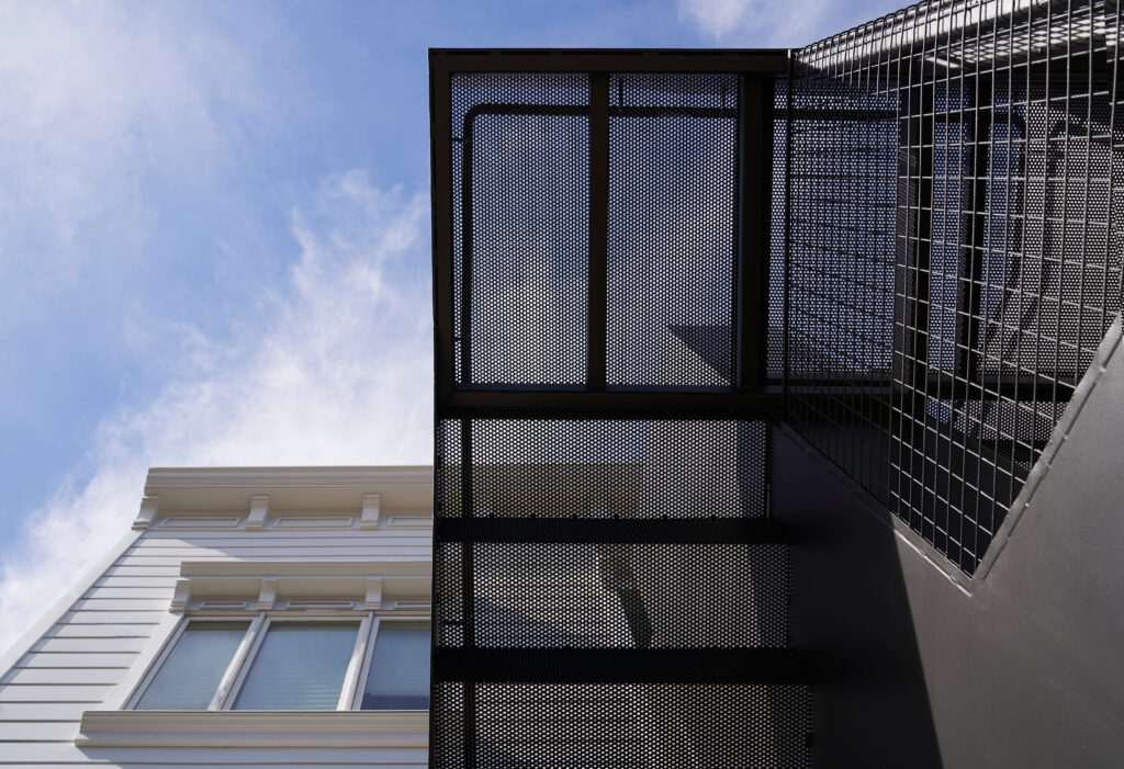 Perforated Steel Landing SF Exterior by Blue Truck Studio