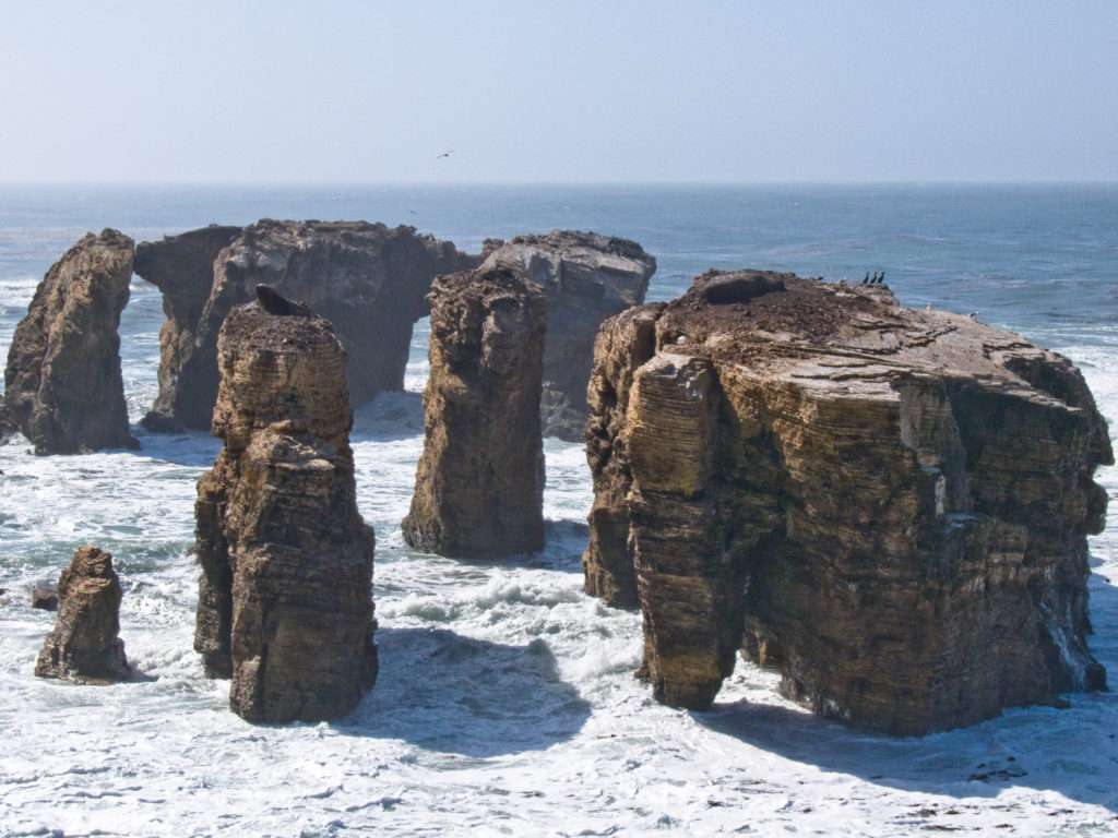 Miguelito Rock Formations off Point Buchon Trail (just south of Moñtana de Oro State Park) and north of the Diablo Nuclear Power Plant - from the Los Osos, CA side. Miguelito shale formations form arches in the Pacific Ocean.