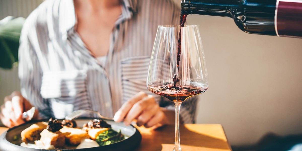 Pouring Wine in Restaurant