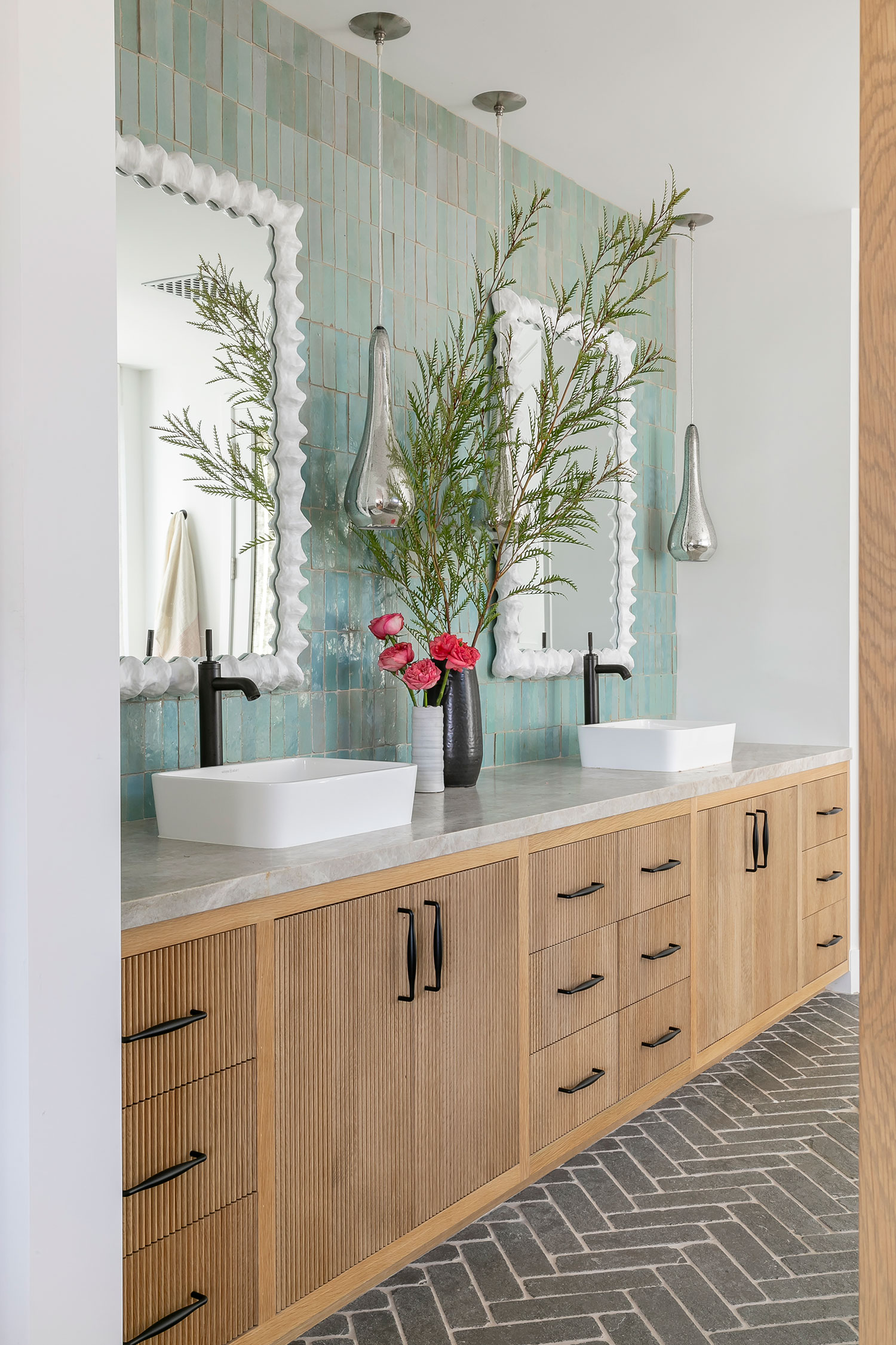 Primary Bathroom in Balboa Island Cottage by Blackband Design