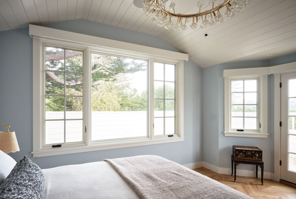 Primary Bedroom in Former Hunting Lodge by JL Interior Design