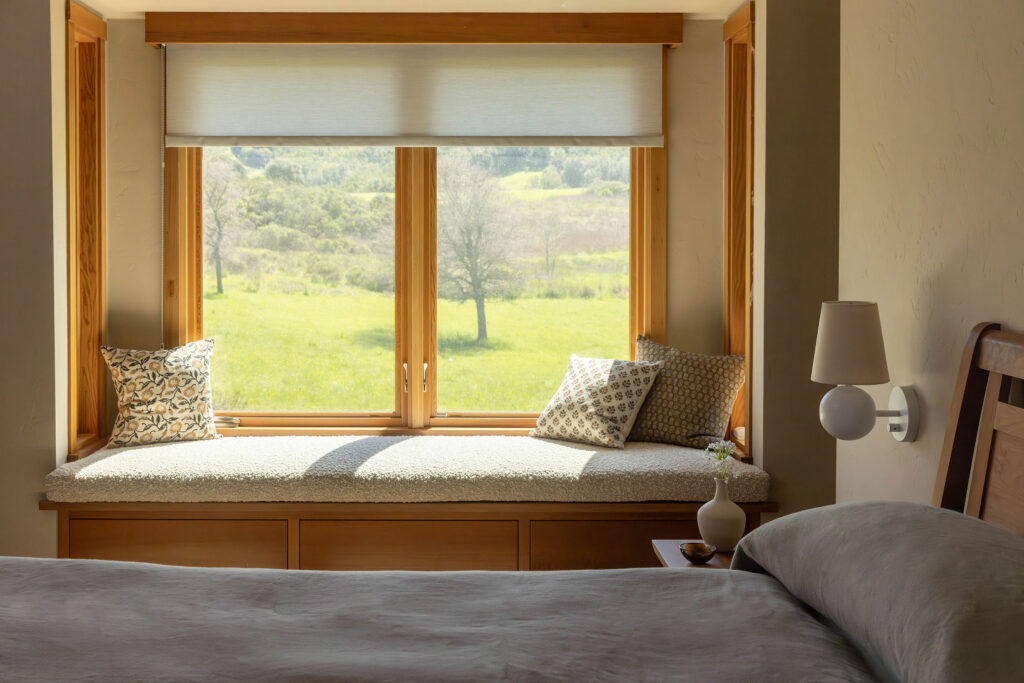 Primary Bedroom in West Marin House by Decorotation