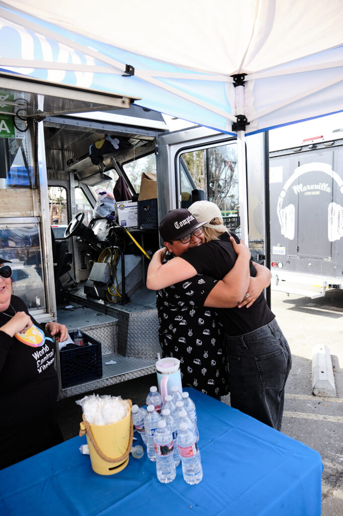 Rodolfo Barrientos Hugs a Customer