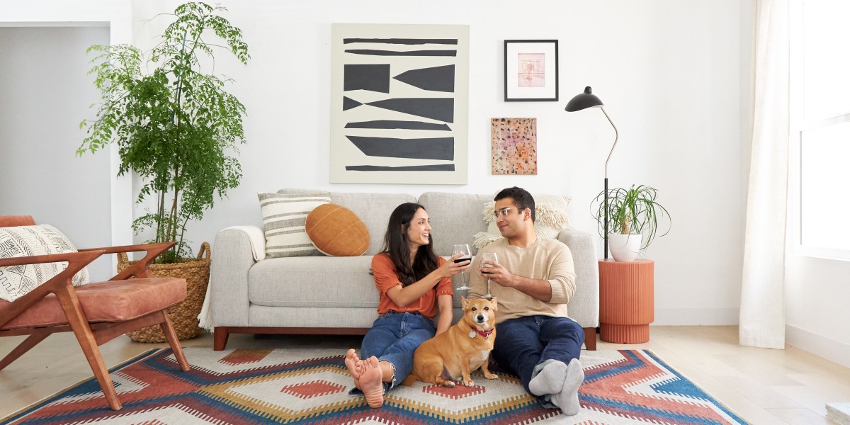 Ruggable washable rug people in living room with dog
