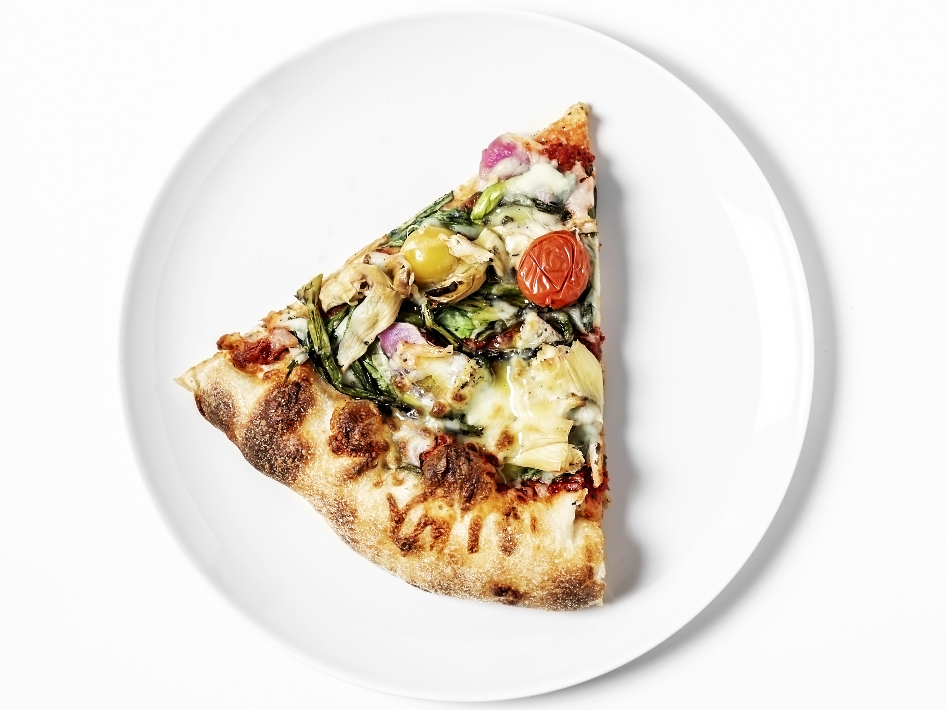 slice of pizza on white