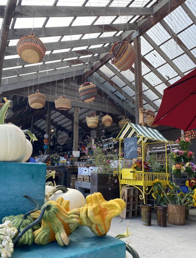 Woven baskets hang from roof of Snow Goose Produce stand in the Seattle area