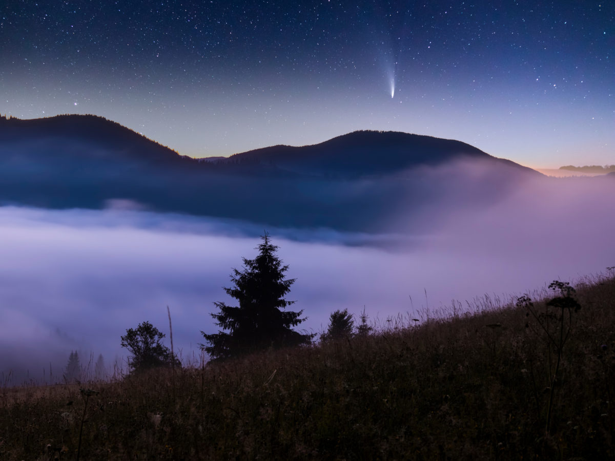 Comet C/2022 E3 (ZTF) over mountains