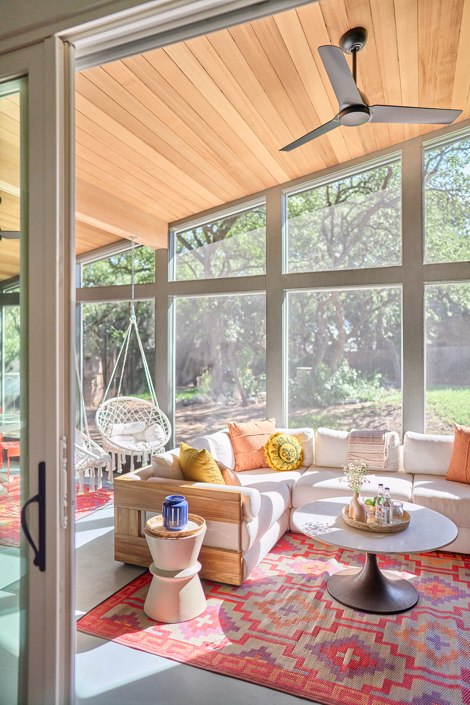 Sunroom in Austin Mid-Century House by CG&S Design-Build