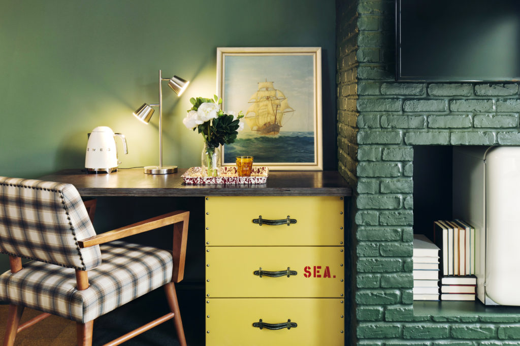 Palihotel Seattle room - desk and green fireplace
