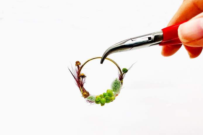 Miniature wreath by Deanna Kizis - close up with hands