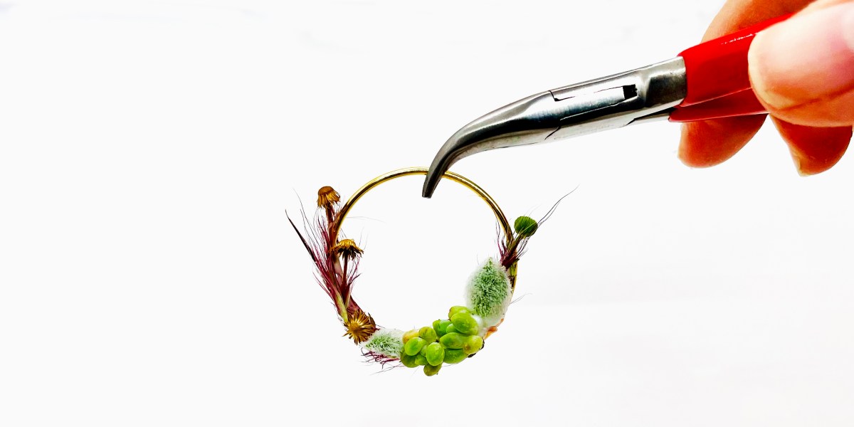 Miniature wreath by Deanna Kizis - close up with hands