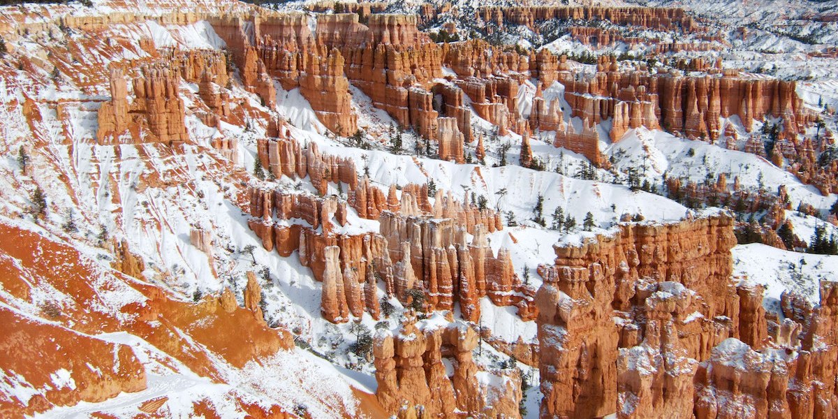 Snow-covered Grand Canyon view from the Rim Trail on a winter hike
