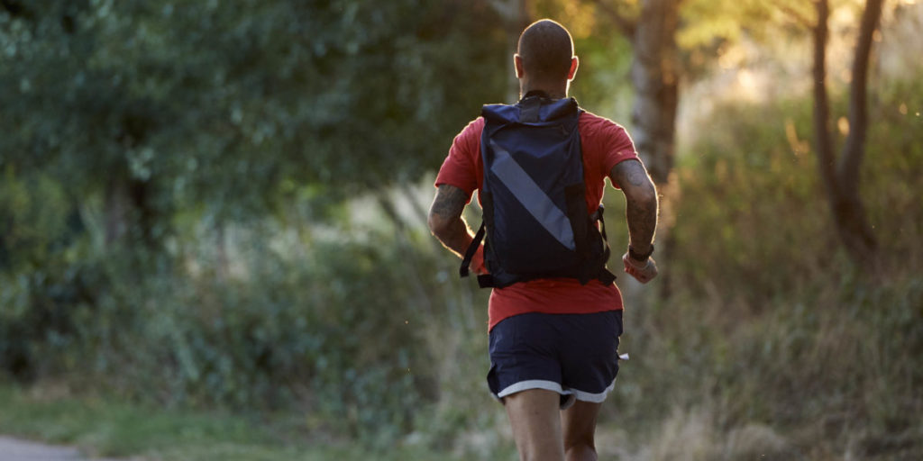 Runner with Tracksmith Backpack