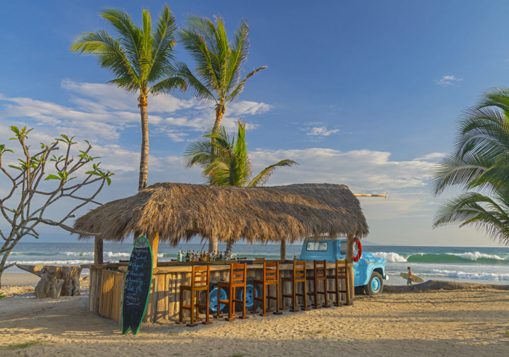 beachside bar surrounds a 1950s Chevy truck