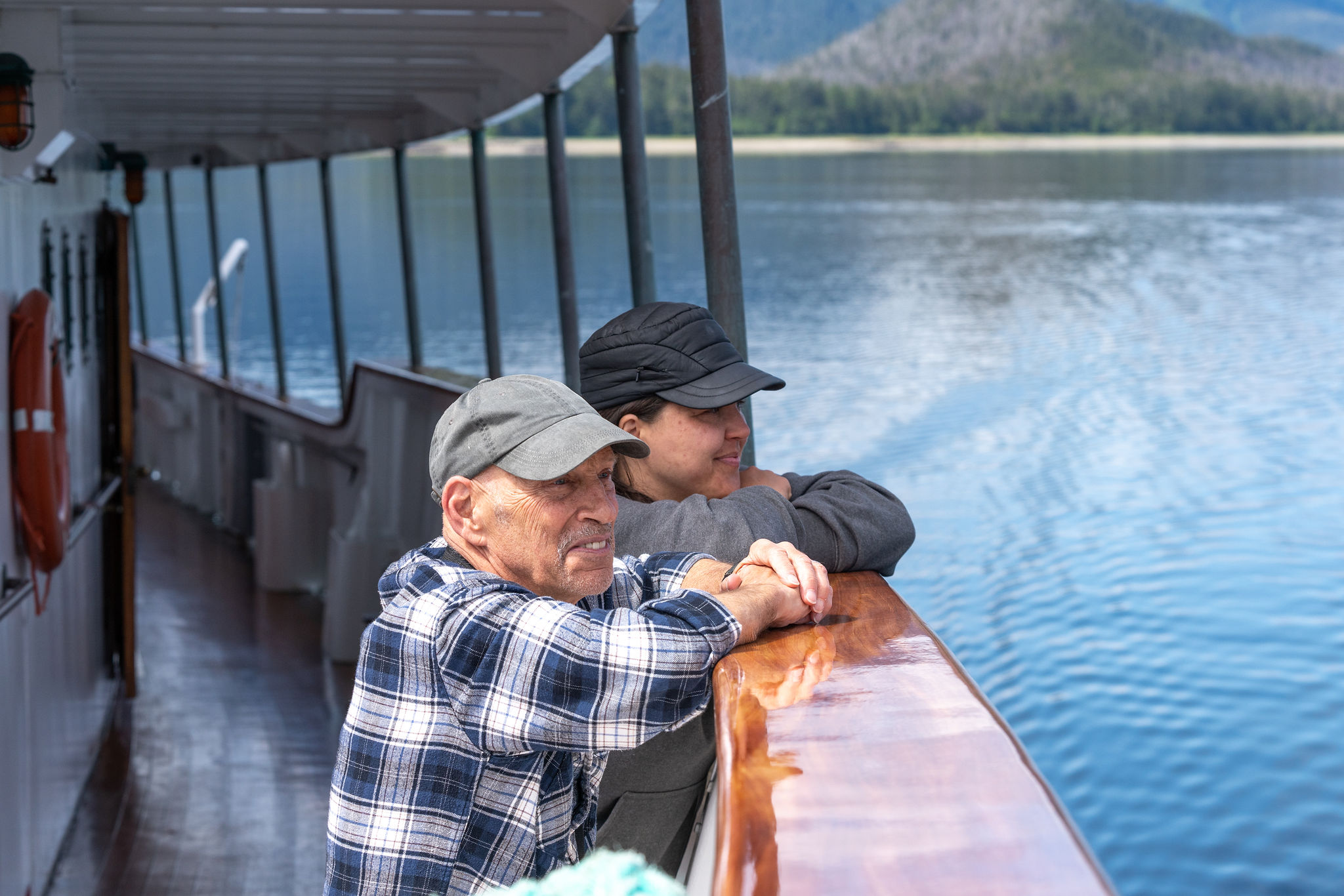 passengers-enjoy-watching-for-whales-while-the-ship-moves-amongst-the-water
